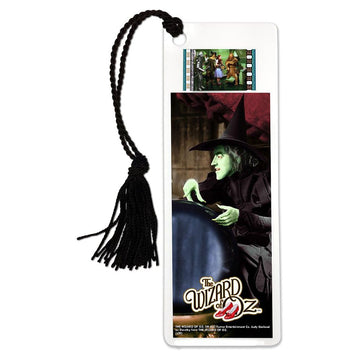A laminated bookmark featuring a film clip of the Wicked Witch of the West from 'The Wizard of Oz' with a black tassel attached.